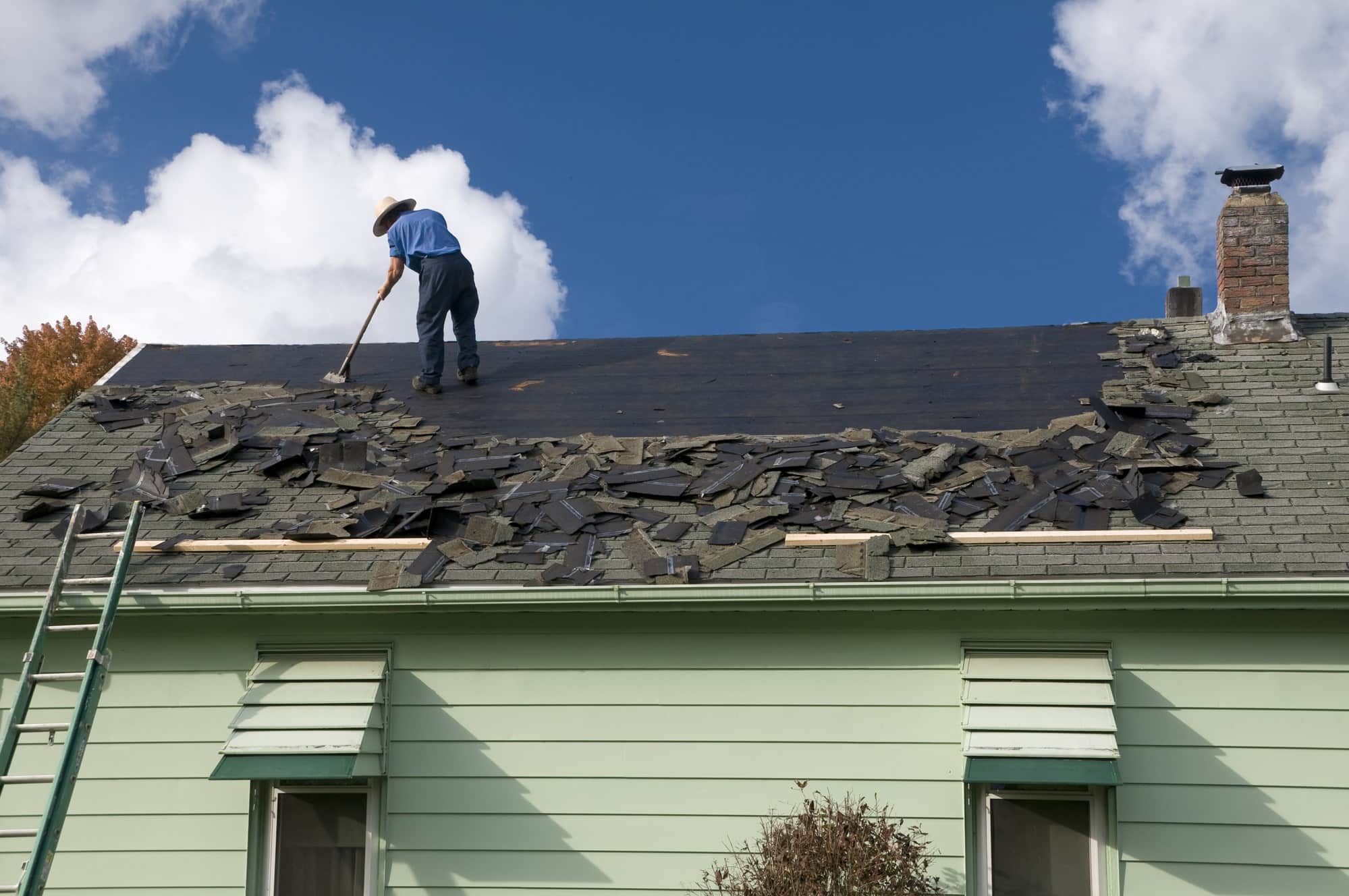 Man doing roof repair in Idaho Falls-min roof repair Idaho Falls