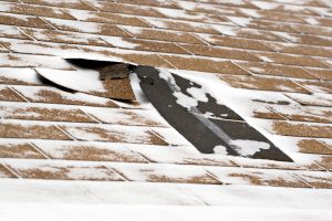 damaged shingles that need winter roof repair